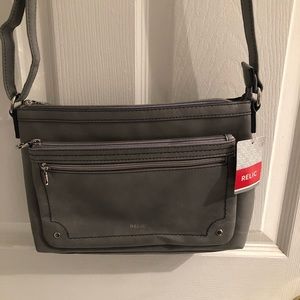 Brand new cross body bag comes with tags